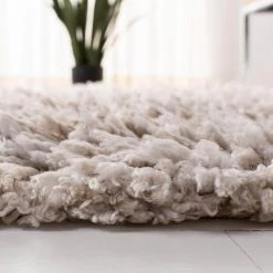 Rio Shag Beige/Ivory 8 ft. x 10 ft. Solid Area Rug by SAFAVIEH -SAFAVIEH Shop beige ivory safavieh area rugs sg960b 8 4f 1000