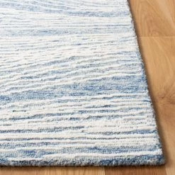 Metro Blue/Ivory 8 ft. x 10 ft. Abstract Waves Area Rug by SAFAVIEH 17 Metro Blue/Ivory 8 ft. x 10 ft. Abstract Waves Area Rug by SAFAVIEH -SAFAVIEH Shop blue ivory safavieh area rugs met995m 8 31 1000