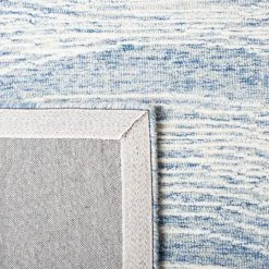 Metro Blue/Ivory 8 ft. x 10 ft. Abstract Waves Area Rug by SAFAVIEH 15 Metro Blue/Ivory 8 ft. x 10 ft. Abstract Waves Area Rug by SAFAVIEH -SAFAVIEH Shop blue ivory safavieh area rugs met995m 8 44 1000