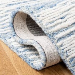 Metro Blue/Ivory 8 ft. x 10 ft. Abstract Waves Area Rug by SAFAVIEH 13 Metro Blue/Ivory 8 ft. x 10 ft. Abstract Waves Area Rug by SAFAVIEH -SAFAVIEH Shop blue ivory safavieh area rugs met995m 8 4f 1000