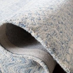 Micro-Loop Blue/Ivory 8 ft. x 10 ft. Distressed Tribal Area Rug by SAFAVIEH -SAFAVIEH Shop blue ivory safavieh area rugs mlp502m 8 1f 1000