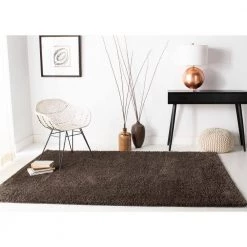 Augustine Brown 8 ft. x 10 ft. Solid Area Rug by SAFAVIEH -SAFAVIEH Shop brown safavieh area rugs aug900t 8 31 1000