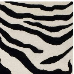 Cambridge Ivory/Black 8 ft. x 10 ft. Area Rug by SAFAVIEH 10 Cambridge Ivory/Black 8 ft. x 10 ft. Area Rug by SAFAVIEH -SAFAVIEH Shop ivory black safavieh area rugs cam709q 8 4f 1000