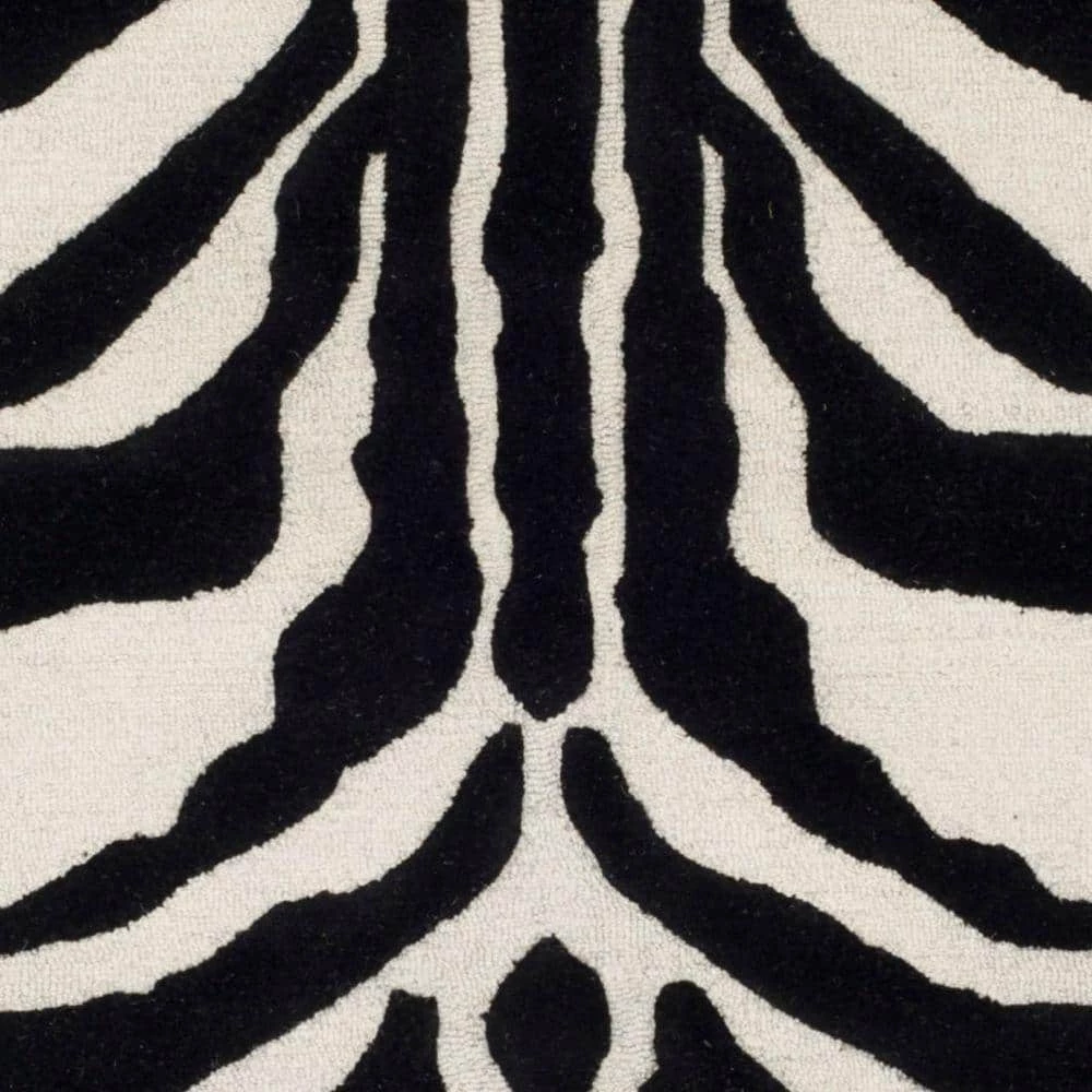 Cambridge Ivory/Black 8 ft. x 10 ft. Area Rug by SAFAVIEH 4 Cambridge Ivory/Black 8 ft. x 10 ft. Area Rug by SAFAVIEH - Image 4