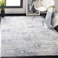Amelia Ivory/Blue 10 ft. x 14 ft. Abstract Distressed Area Rug by SAFAVIEH -SAFAVIEH Shop ivory blue safavieh area rugs ala700a 10 31 1000