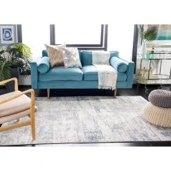 Amelia Ivory/Blue 9 ft. x 12 ft. Abstract Distressed Area Rug by SAFAVIEH -SAFAVIEH Shop ivory blue safavieh area rugs ala700a 9 31 1000