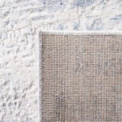 Amelia Ivory/Blue 9 ft. x 12 ft. Abstract Distressed Area Rug by SAFAVIEH -SAFAVIEH Shop ivory blue safavieh area rugs ala700a 9 44 1000