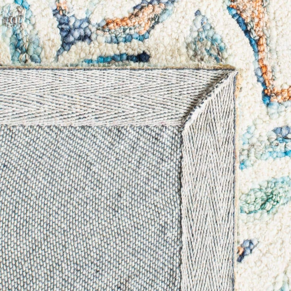 Capri Ivory/Blue 9 ft. x 12 ft. Geometric Leaf Area Rug by SAFAVIEH 6 Capri Ivory/Blue 9 ft. x 12 ft. Geometric Leaf Area Rug by SAFAVIEH - Image 6