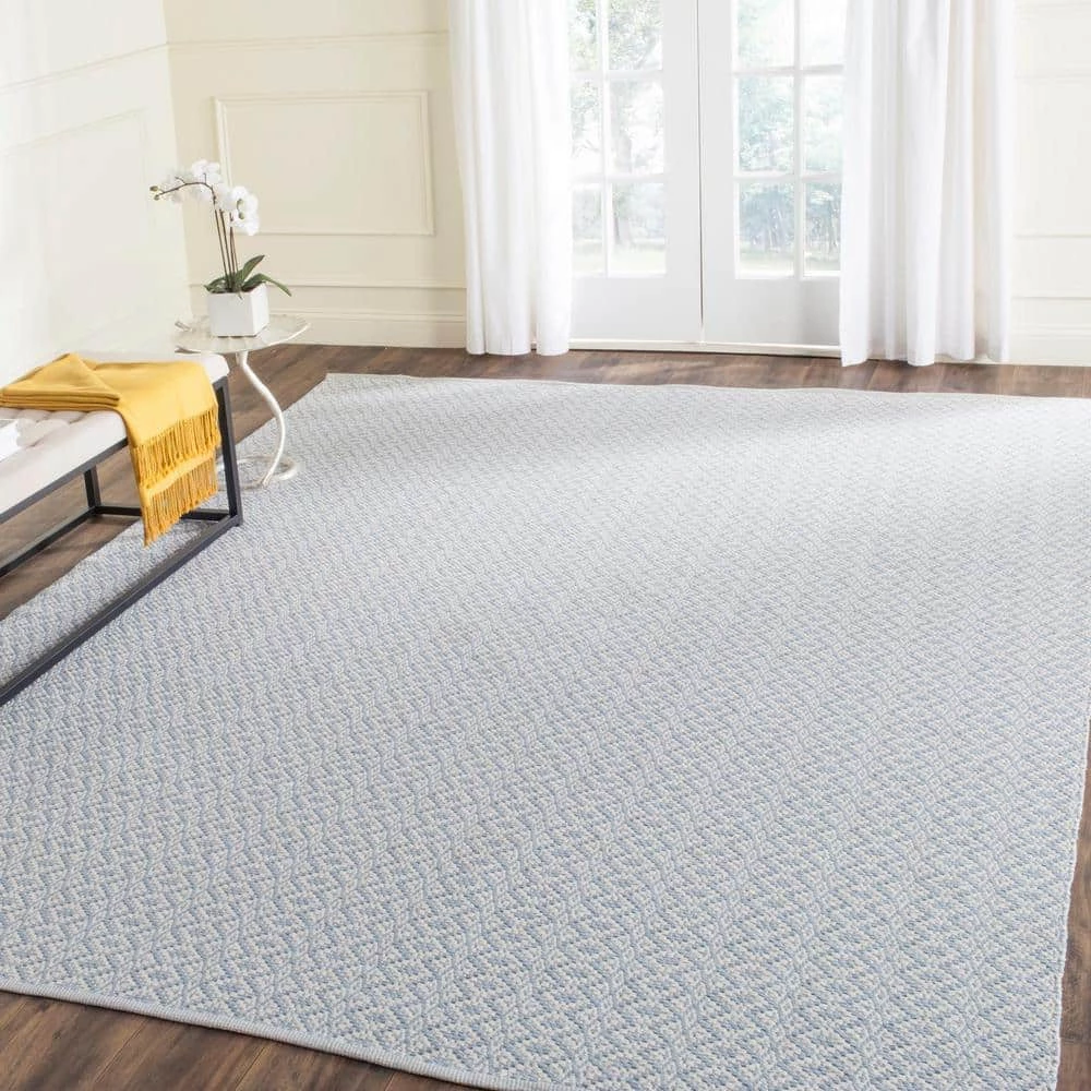 Montauk Ivory/Light Blue 8 ft. x 10 ft. Solid Area Rug by SAFAVIEH 2 Montauk Ivory/Light Blue 8 ft. x 10 ft. Solid Area Rug by SAFAVIEH - Image 2