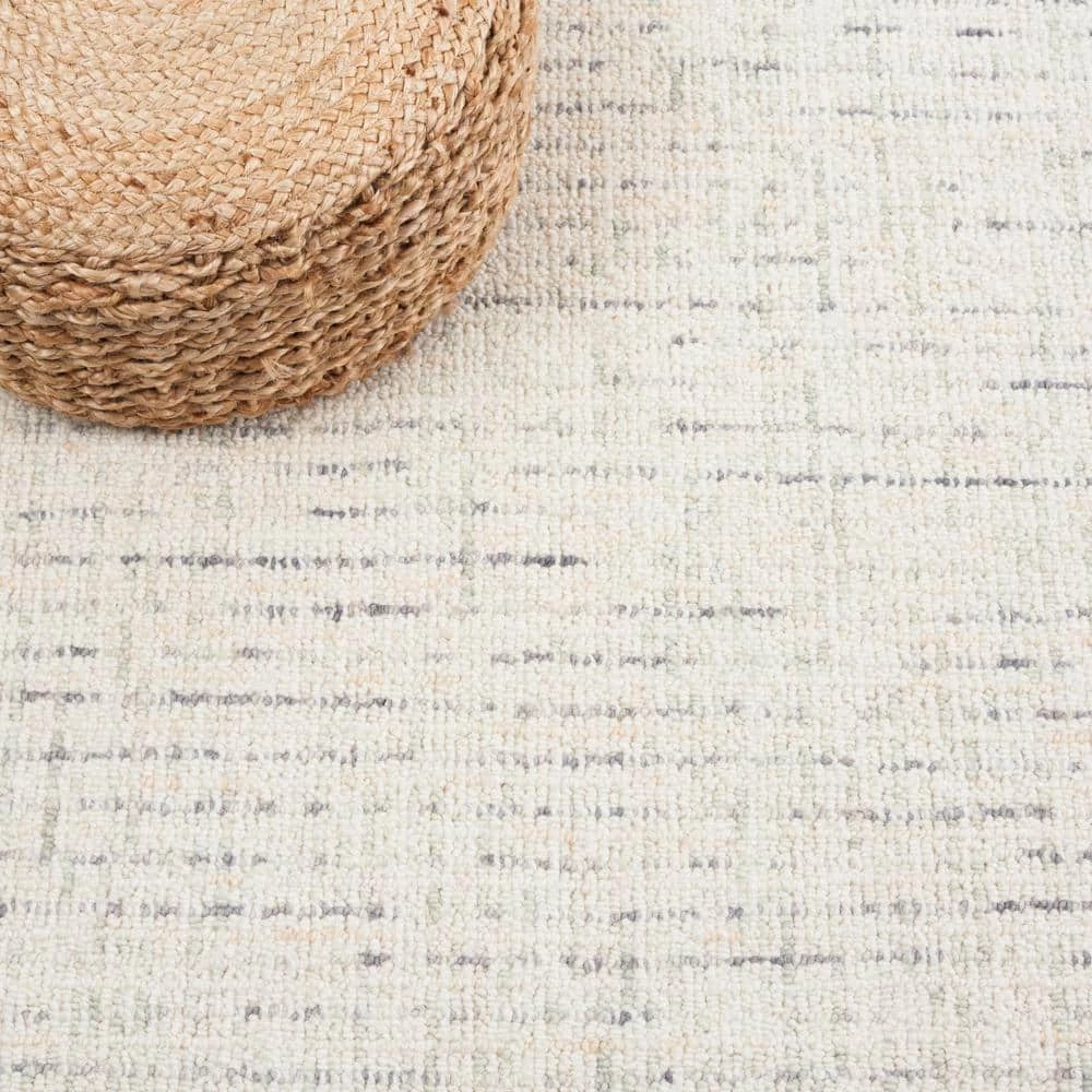 Abstract Ivory/Light Gray 9 ft. x 12 ft. Speckled Area Rug by SAFAVIEH 7 Abstract Ivory/Light Gray 9 ft. x 12 ft. Speckled Area Rug by SAFAVIEH - Image 7