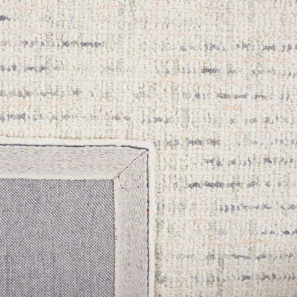 Abstract Ivory/Light Gray 9 ft. x 12 ft. Speckled Area Rug by SAFAVIEH 3 Abstract Ivory/Light Gray 9 ft. x 12 ft. Speckled Area Rug by SAFAVIEH - Image 3