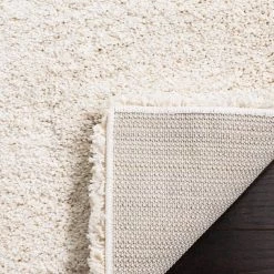 Milan Shag Ivory 8 ft. x 10 ft. Solid Area Rug by SAFAVIEH 17 Milan Shag Ivory 8 ft. x 10 ft. Solid Area Rug by SAFAVIEH -SAFAVIEH Shop ivory safavieh area rugs sg180 1212 8 1d 1000