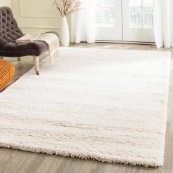 Milan Shag Ivory 8 ft. x 10 ft. Solid Area Rug by SAFAVIEH 22 Milan Shag Ivory 8 ft. x 10 ft. Solid Area Rug by SAFAVIEH -SAFAVIEH Shop ivory safavieh area rugs sg180 1212 8 44 1000