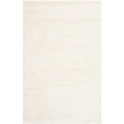Milan Shag Ivory 8 ft. x 10 ft. Solid Area Rug by SAFAVIEH