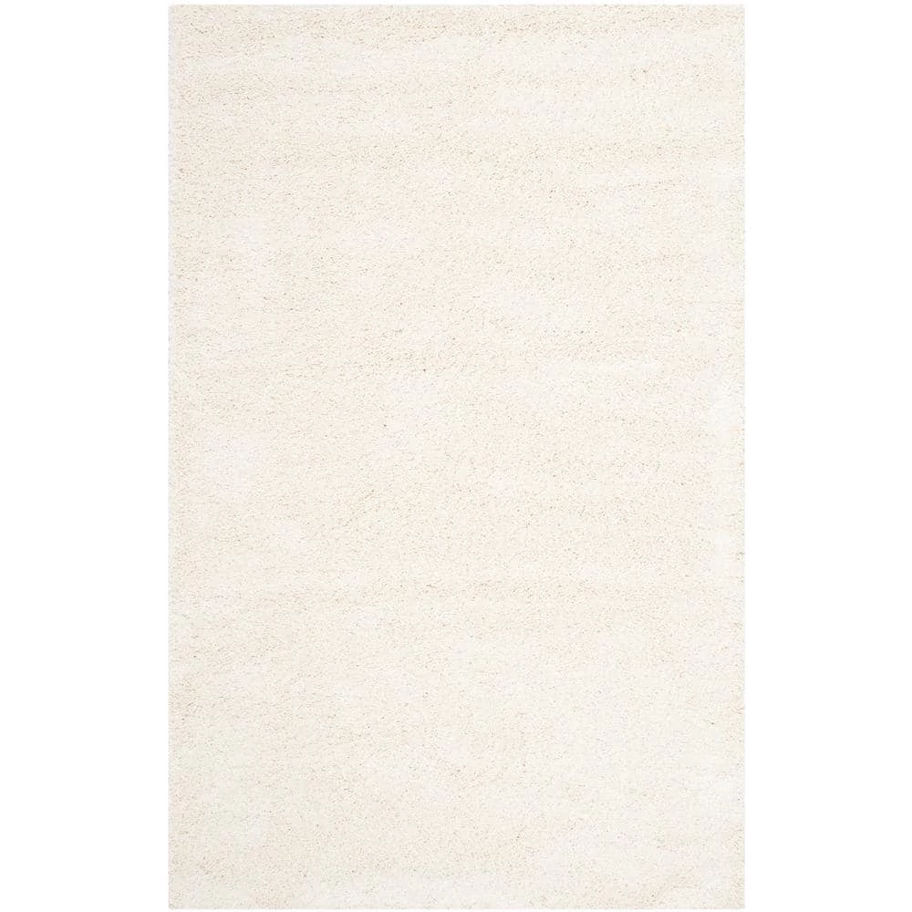 Milan Shag Ivory 8 ft. x 10 ft. Solid Area Rug by SAFAVIEH 1 Milan Shag Ivory 8 ft. x 10 ft. Solid Area Rug by SAFAVIEH