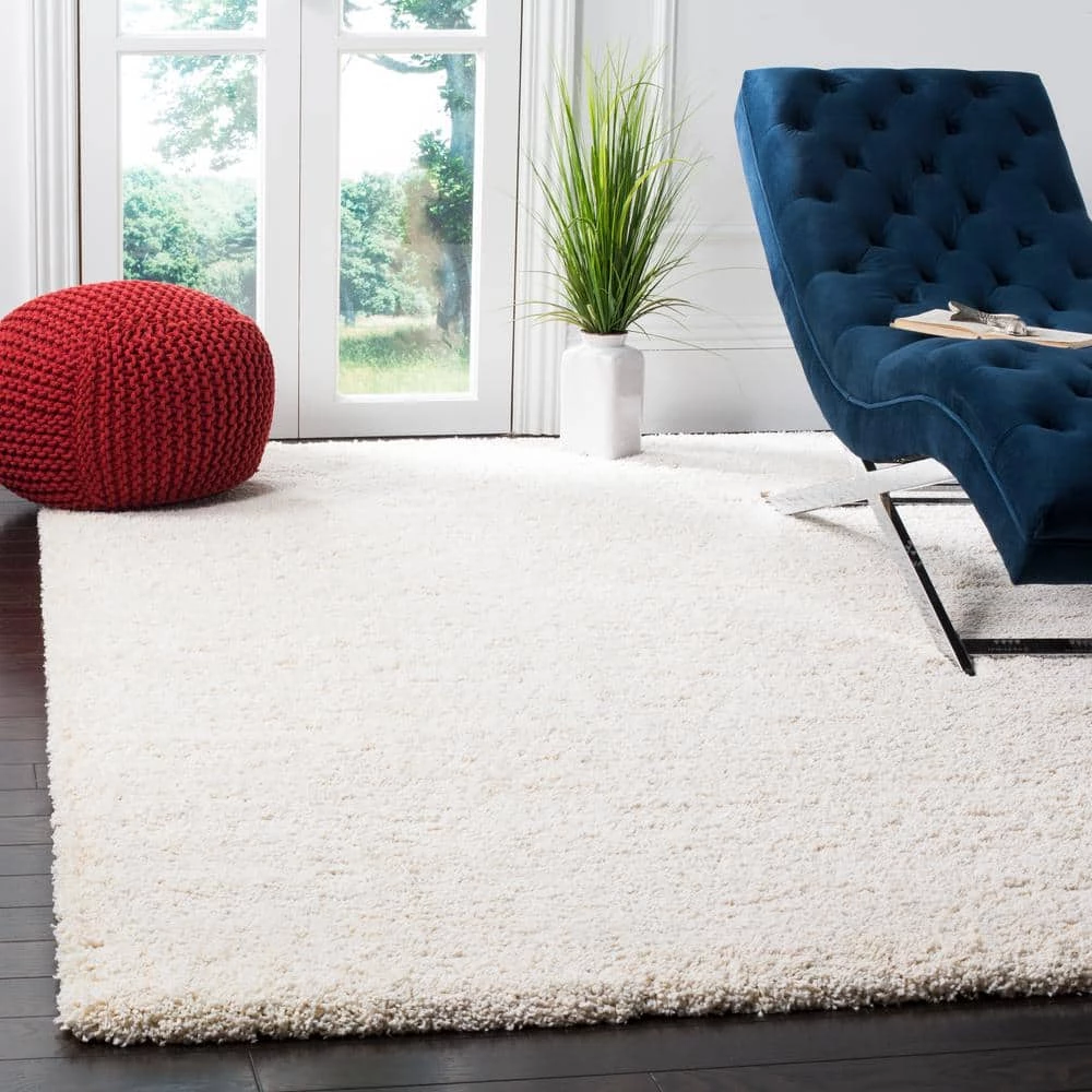 Milan Shag Ivory 8 ft. x 10 ft. Solid Area Rug by SAFAVIEH 2 Milan Shag Ivory 8 ft. x 10 ft. Solid Area Rug by SAFAVIEH - Image 2