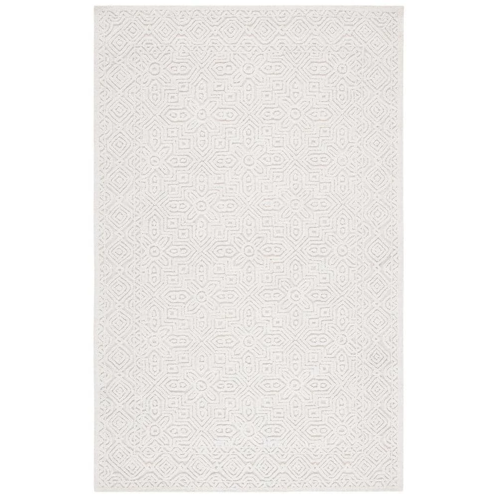 Textural Ivory 8 ft. x 10 ft. Solid Color Geometric Area Rug by SAFAVIEH 1 Textural Ivory 8 ft. x 10 ft. Solid Color Geometric Area Rug by SAFAVIEH