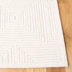 Textural Ivory 9 ft. x 12 ft. Geometric Solid Color Area Rug by SAFAVIEH -SAFAVIEH Shop ivory safavieh area rugs txt102a 9 31 1000