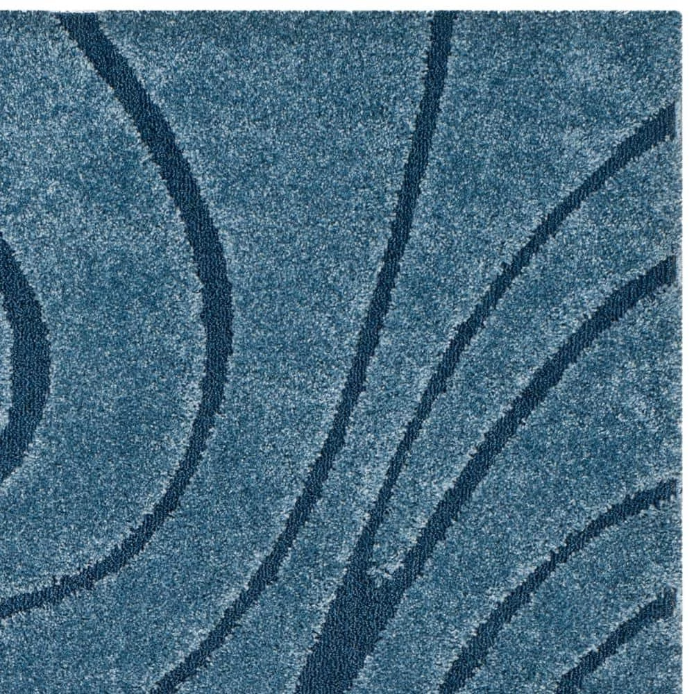 Florida Shag Light Blue/Blue 9 ft. x 12 ft. Solid Area Rug by SAFAVIEH 7 Florida Shag Light Blue/Blue 9 ft. x 12 ft. Solid Area Rug by SAFAVIEH - Image 7