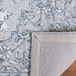 Micro-Loop Light Blue/Ivory 9 ft. x 12 ft. Border Area Rug by SAFAVIEH -SAFAVIEH Shop light blue ivory safavieh area rugs mlp504m 9 44 1000