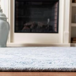 Micro-Loop Light Blue/Ivory 9 ft. x 12 ft. Border Area Rug by SAFAVIEH -SAFAVIEH Shop light blue ivory safavieh area rugs mlp504m 9 4f 1000