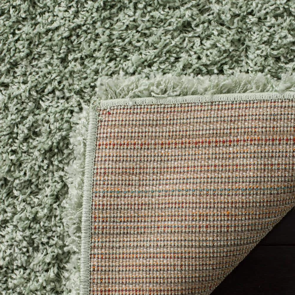 Laguna Shag Light Sage 8 ft. x 10 ft. Solid Area Rug by SAFAVIEH 5 Laguna Shag Light Sage 8 ft. x 10 ft. Solid Area Rug by SAFAVIEH - Image 5