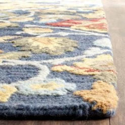 Blossom Navy/Multi 9 ft. x 12 ft. Area Rug by SAFAVIEH -SAFAVIEH Shop navy multi safavieh area rugs blm402a 9 1f 1000