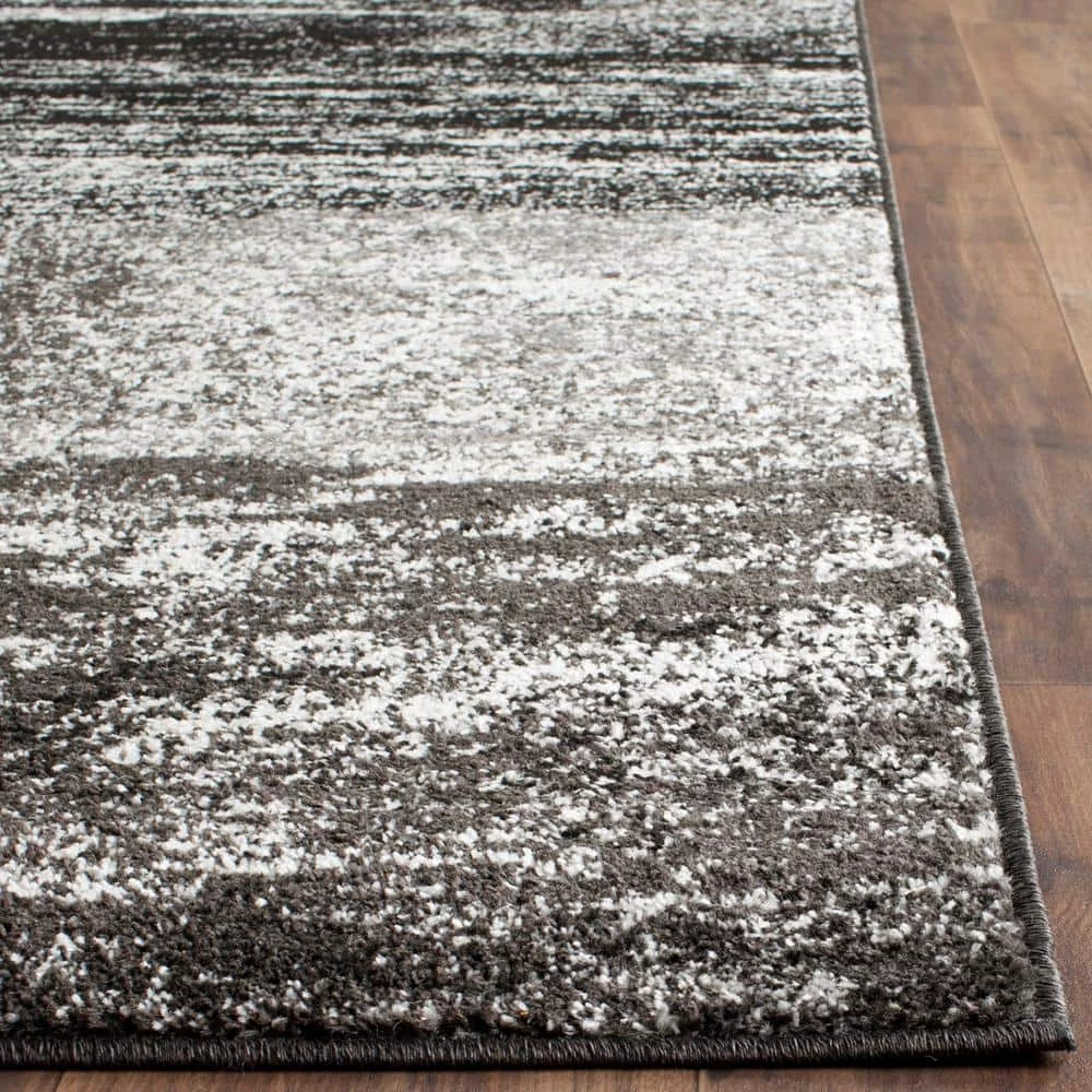 Adirondack Silver/Black 8 ft. x 10 ft. Solid Distressed Area Rug by SAFAVIEH 8 Adirondack Silver/Black 8 ft. x 10 ft. Solid Distressed Area Rug by SAFAVIEH - Image 8