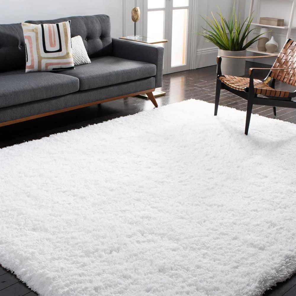 Polar Shag White 7 ft. x 9 ft. Solid Area Rug by SAFAVIEH 10 Polar Shag White 7 ft. x 9 ft. Solid Area Rug by SAFAVIEH - Image 10