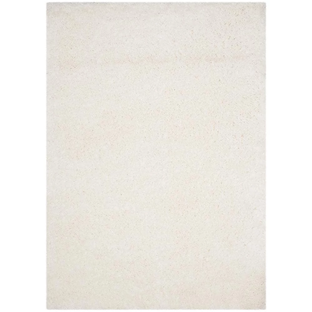 Polar Shag White 7 ft. x 9 ft. Solid Area Rug by SAFAVIEH 1 Polar Shag White 7 ft. x 9 ft. Solid Area Rug by SAFAVIEH