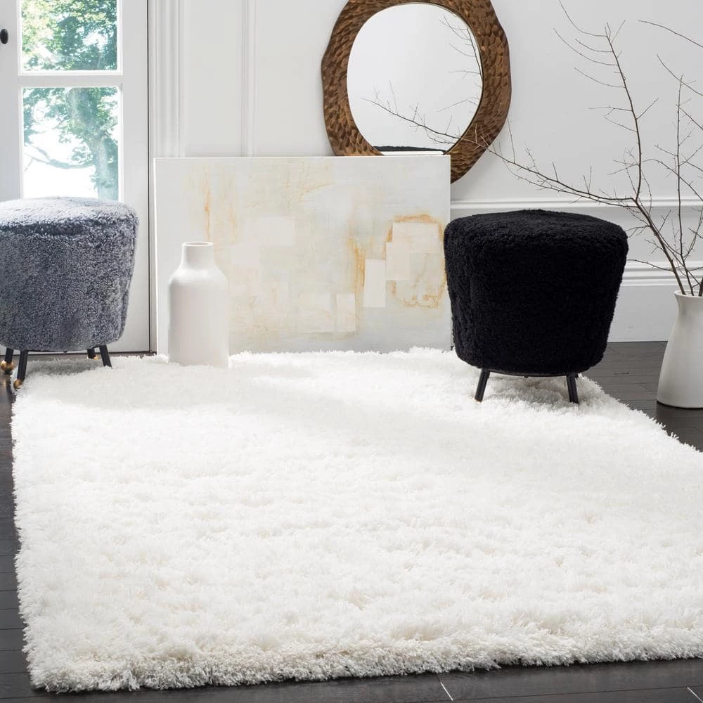 Polar Shag White 7 ft. x 9 ft. Solid Area Rug by SAFAVIEH 2 Polar Shag White 7 ft. x 9 ft. Solid Area Rug by SAFAVIEH - Image 2
